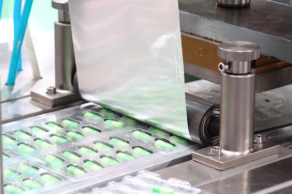 Medicine capsules packing machine